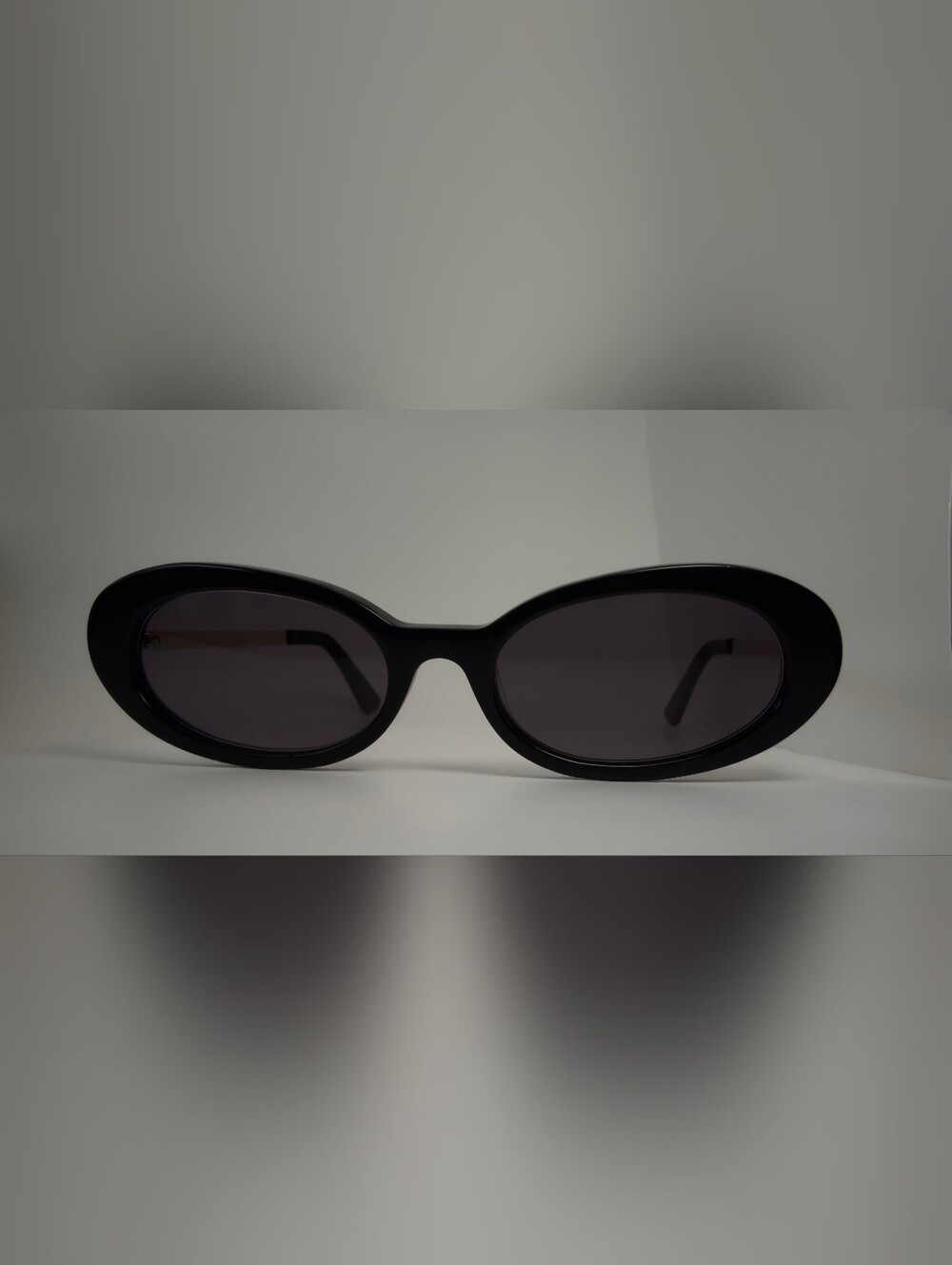 Winona. Classic Black Oval Women's. Light Blocking Design.
